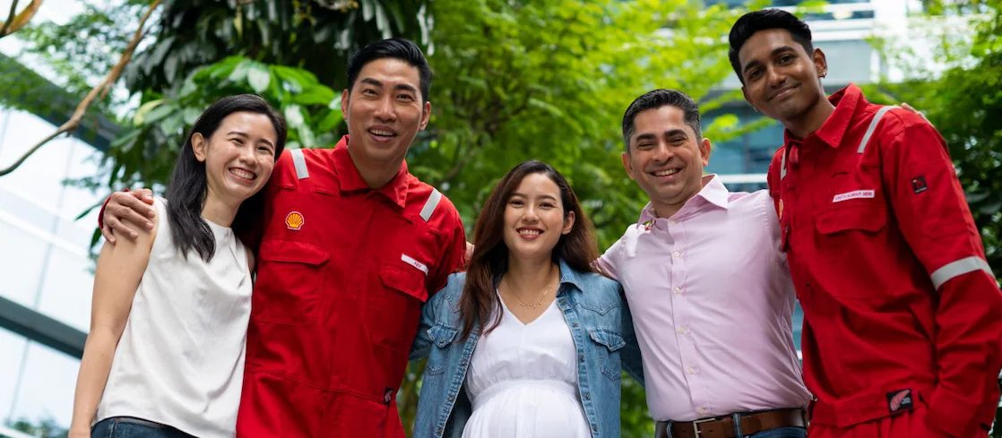 employees posing for a photo